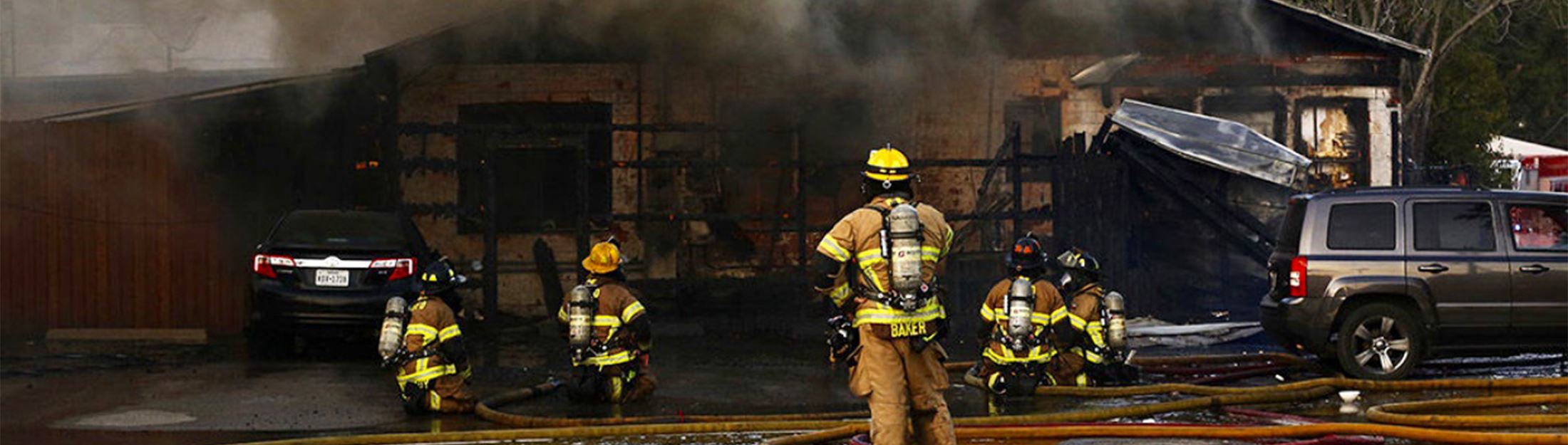 Firefighters at the scene of a structure fire